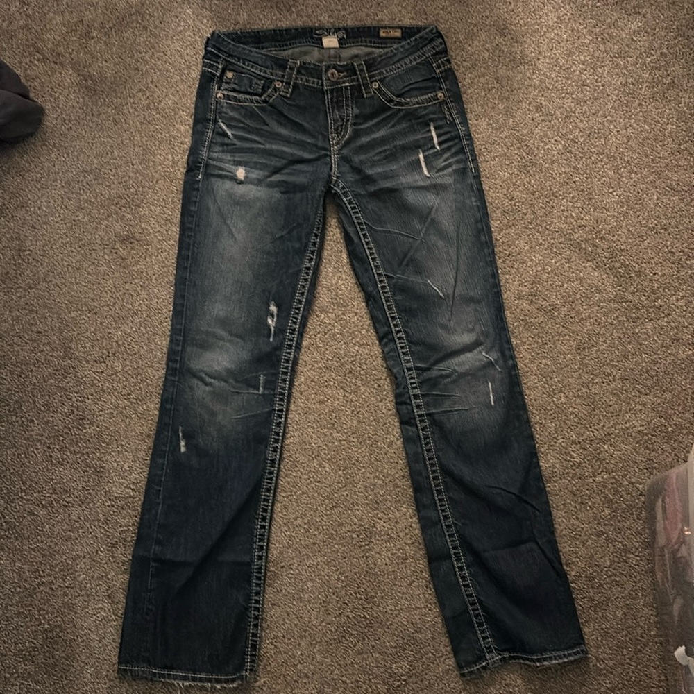 Women's Distressed Blue Jeans